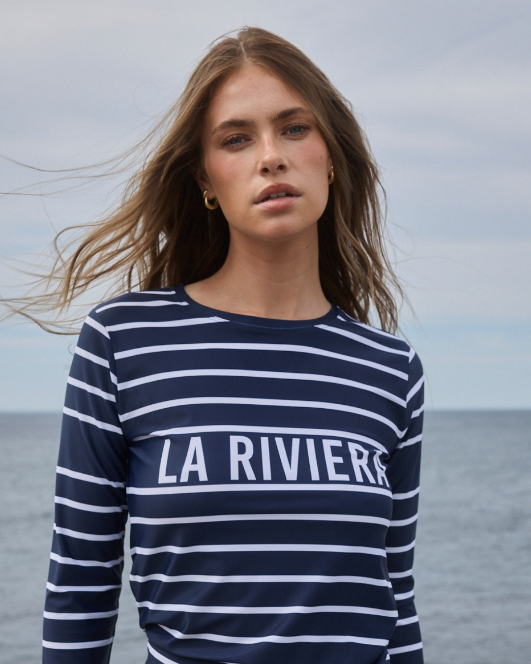 La Riviera UPF50+ rashguard front close up navy striped womens swimwear