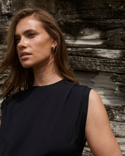 Close-up of relaxed swim tank in premium black fabric