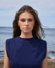 Close-up of navy relaxed swim tank highlighting italian fabric