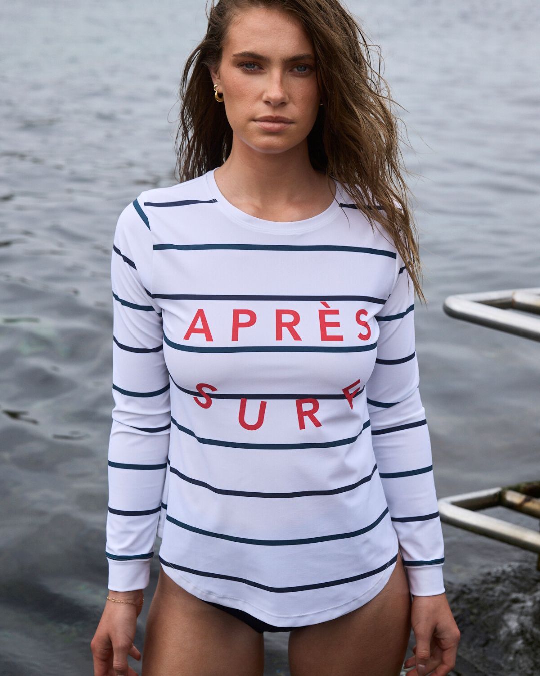 Après Surf UPF50+ womens rash guard with navy stripes and relaxed fit