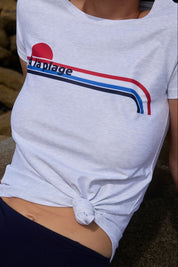 Detail shot of À La Plage print on chlorine-resistant swim tee